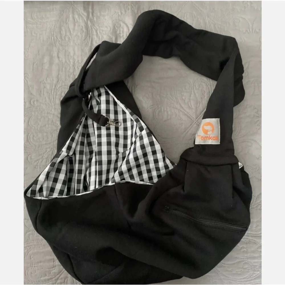 Tomkas Dog Carrier Sling for small cats and dogs.
